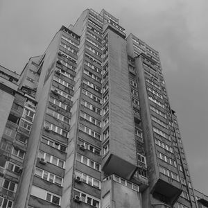 Low angle view of modern buildings against sky