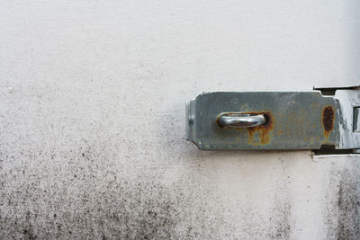 Close-up of rusty metal on wall