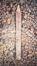 High angle view of cigarette on stone