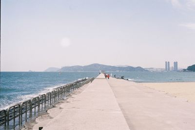 Scenic view of the sea, the sky, and the city