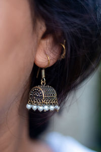 Close-up of woman wearing earrings