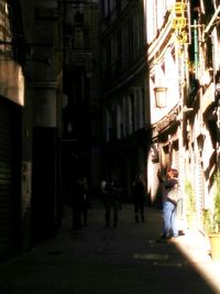 People walking on street in city