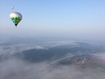 Aerial view of hot air balloon against sky