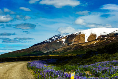 Scenic view of purple mountains against sky