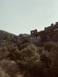 Abandoned building against clear sky