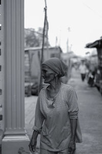 Young woman looking at city