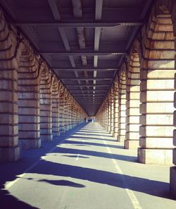 Shadow of person on bridge