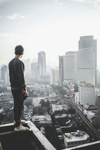 Woman standing in city