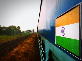 Close-up of train against sky