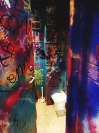 Graffiti on glass window at night