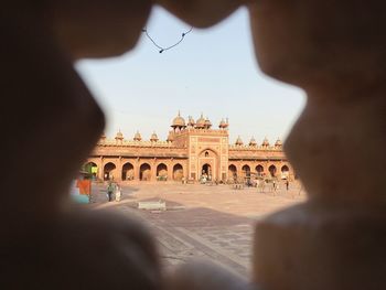 People in front of historical building