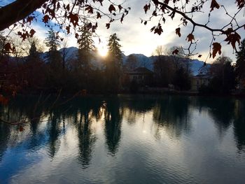 Scenic view of lake against sky during sunset