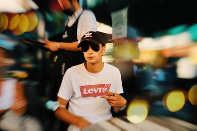 Full length of man wearing sunglasses standing outdoors