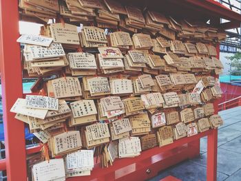 Praying notes on stand at hanazono jinja shrine