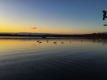 Scenic view of sea at sunset