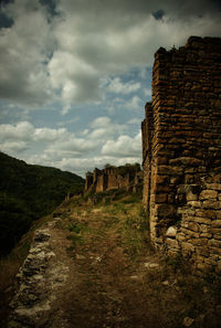 Old ruin building against sky