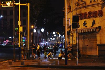 Illuminated street light at night