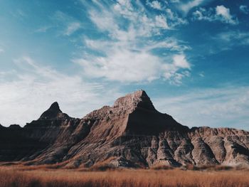 Scenic view of rocky mountains against sky