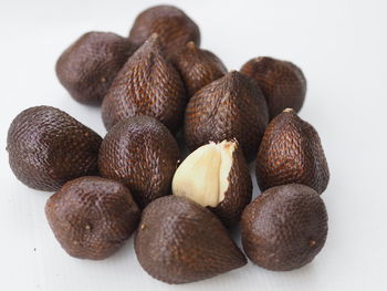 Close-up of fruits against white background