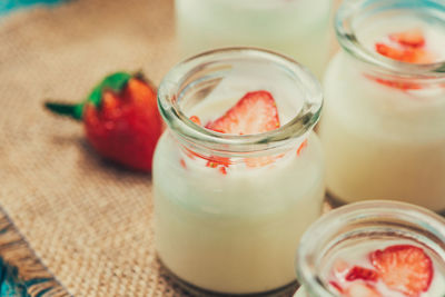Close-up of cocktail in glass jar on table