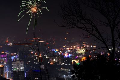 Firework display at night