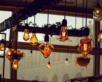 Low angle view of illuminated chandelier