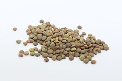 High angle view of candies against white background