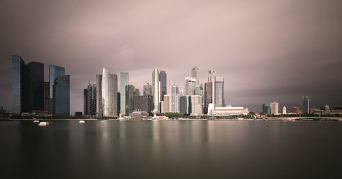 Panoramic view of buildings in city against sky