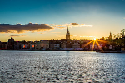 German church in town by riddarfjarden during sunset