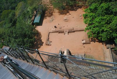 High angle view of building by trees