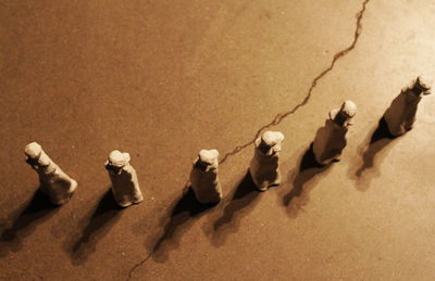 High angle view of shells on sand