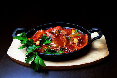 High angle view of food on table against black background