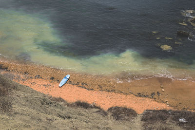 High angle view of umbrella on beach