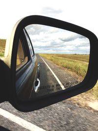 Close-up of car on side-view mirror