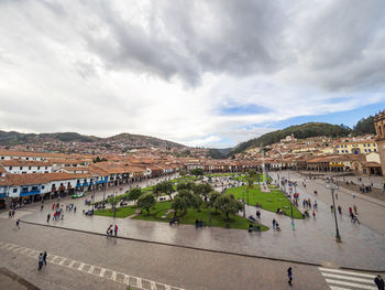 High angle view of people on town against sky