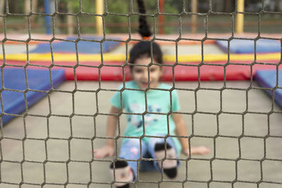 Low section of woman playing soccer