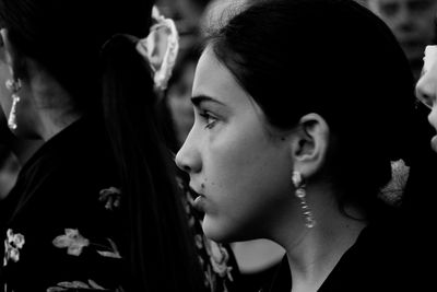 Close-up of women looking away during festival