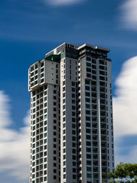 Low angle view of modern building against sky