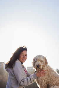 Smiling woman with dog