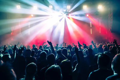 Crowd at music concert during night