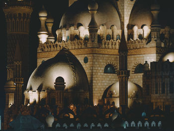 Group of people in front of historic building
