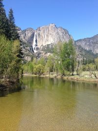 Scenic view of river and mountains