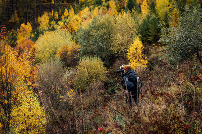 Man in autumn forest