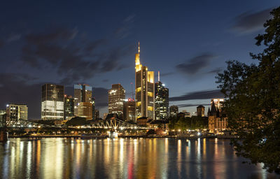 Illuminated buildings at waterfront