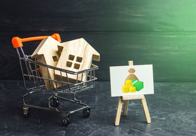 High angle view of shopping cart on table