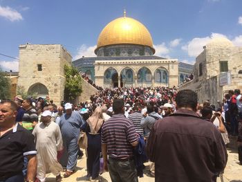Group of people in front of building