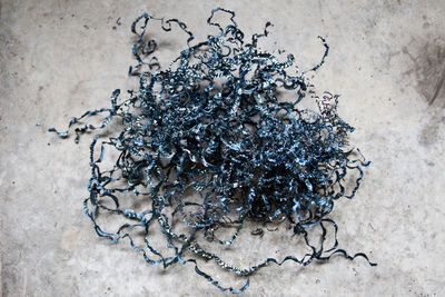 High angle view of ice cream on sand