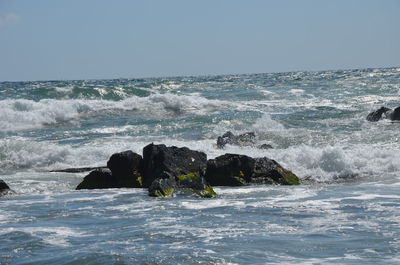 Scenic view of sea against clear sky