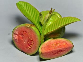 Close-up of fruits against white background