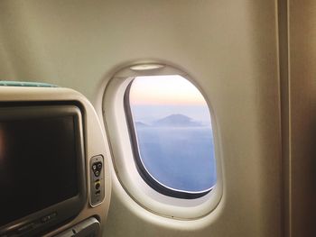 Mountain view seen through airplane window